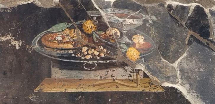 Fresco from Pompeii showing what might be the first pizza
