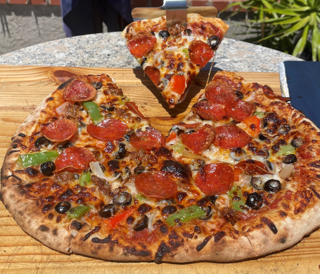 Sourdough Neapolitan Supreme Pizza.