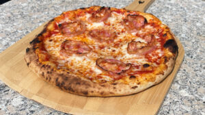 Biga Pizza Dough with spiral bacon topping.