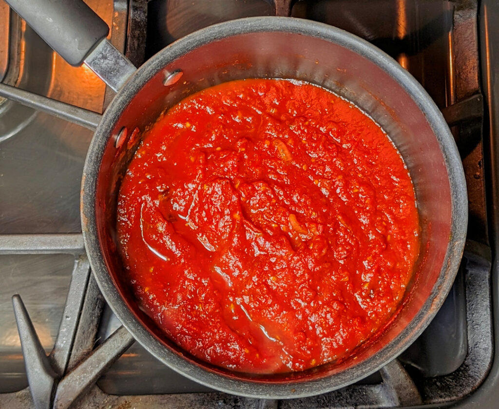 Cooked pizza sauce.