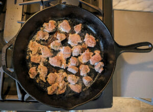 Spiedie lamb in the cast iron.