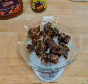 The lamb has cooled and ready to slice for the pizza.