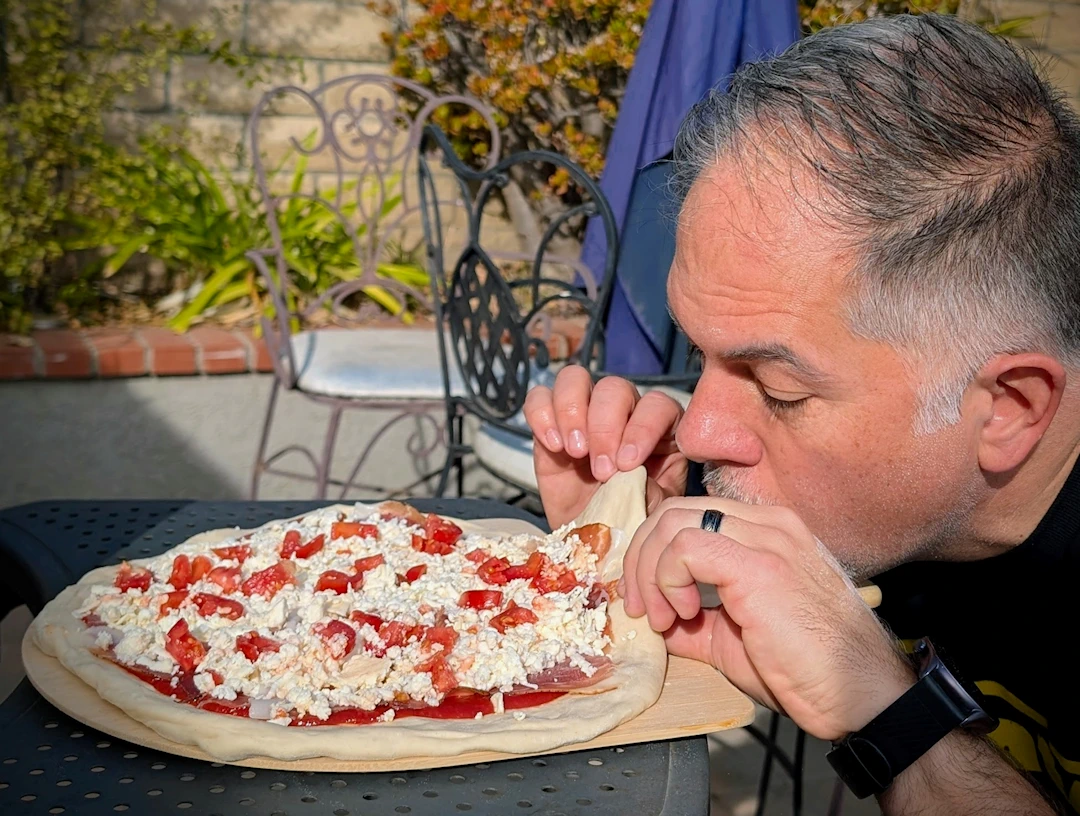 Blow under the pizza dough to dislodge it from the peel!
