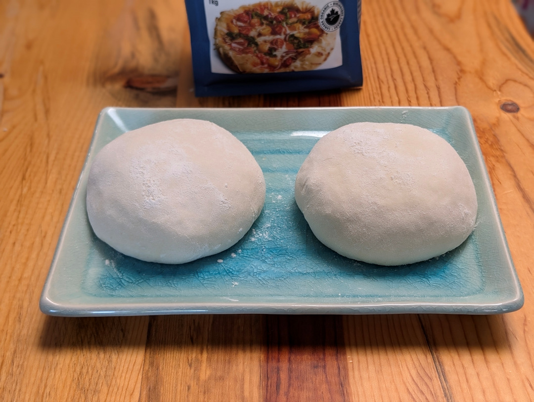 Two dough balls made with Anita's flour.