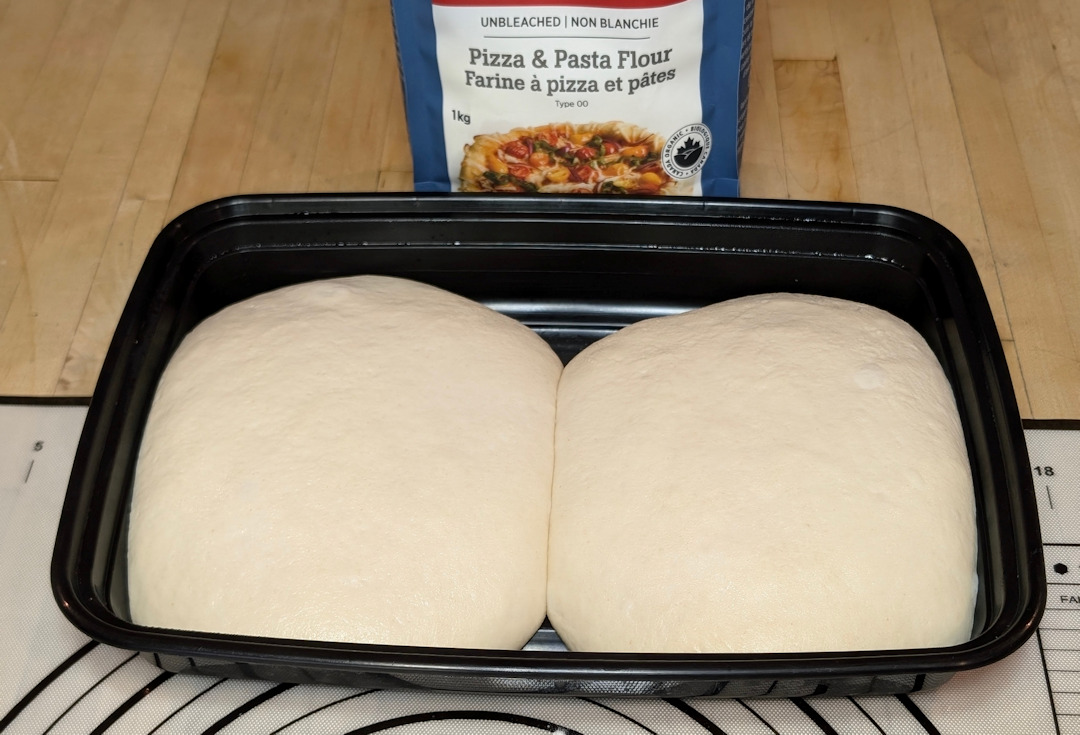 Anita's flour dough balls puffed up nicely after 24 hours at room temperature.