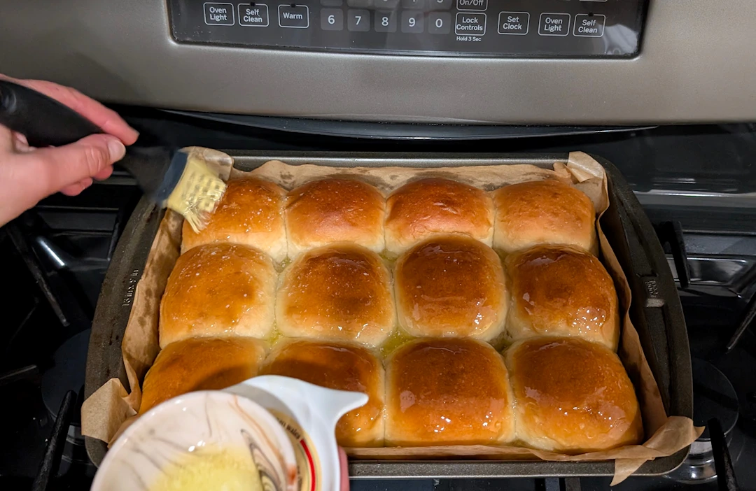 Brush with warm, melted butter.